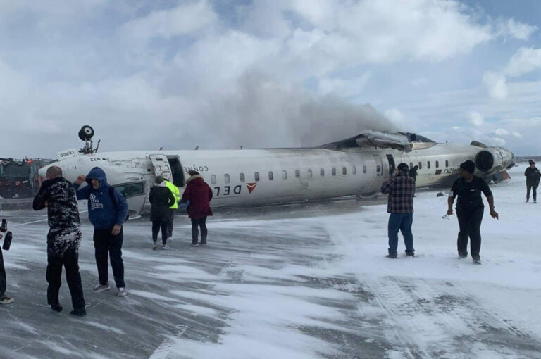 Delta Air Lines regional jet flips upside down after landing at Toronto Pearson International Airport, injuring 18 passengers. Photo credit: Reuters