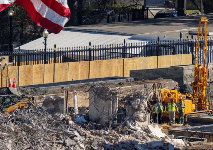 Construction crews work amid rubble near the East Wing of the White House, as demolition begins for Donald Trump’s proposed gold-tinted ballroom a controversial project drawing comparisons to India’s chaotic infrastructure ventures (Image: Reuters)