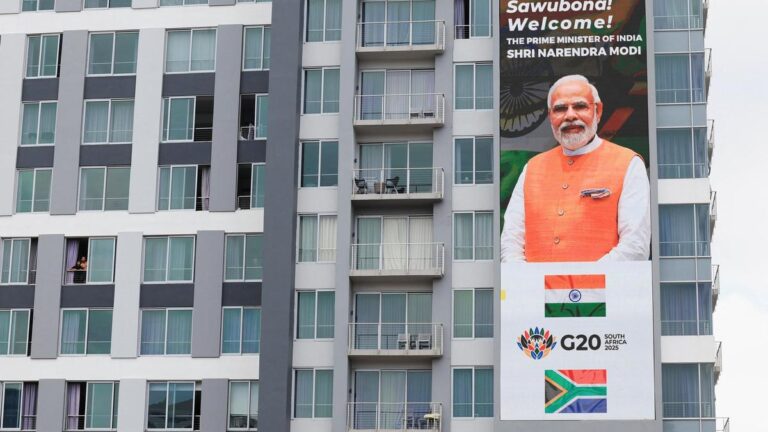 A poster of Prime Minister Narendra Modi ahead of the G20 Summit, in Johannesburg, South Africa, November 20, 2025. (Photo Credit: Reuters)