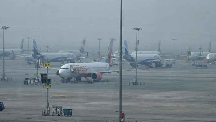 Aircraft remain parked at Indira Gandhi International Airport as dense fog and hazardous air quality disrupt flight operations across Delhi and parts of northern India. (PC: R.V. Moorthy)