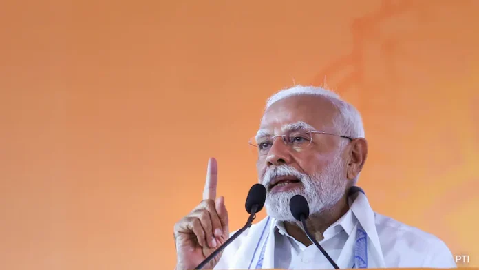 Prime Minister Narendra Modi addresses a campaign rally in Palakkad, Kerala, assuring voters that the government is working to protect nearly one crore Indians in Gulf countries amid the escalating Middle East conflict. (PC: PTI)