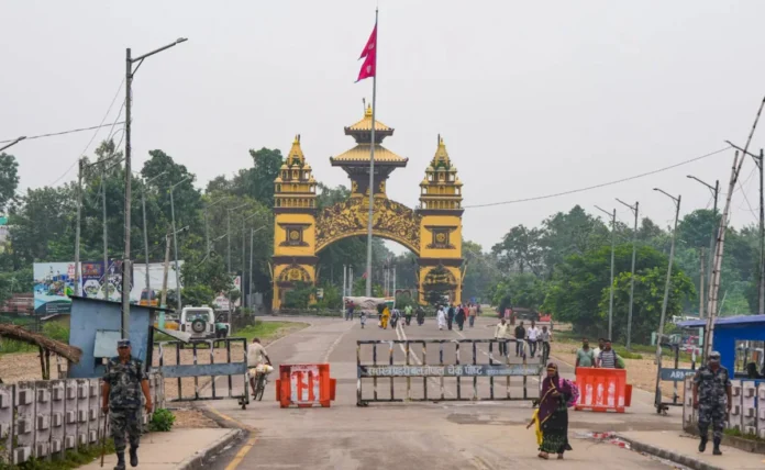 Voters stand in line outside a polling station in Nepal during the country’s first national election following the youth-led protests that reshaped its political landscape. (PC: NDTV)